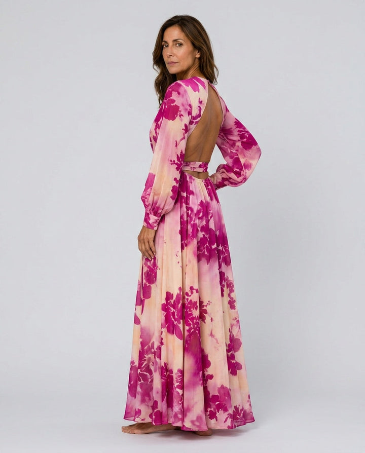 Fashionable women's floral wrap maxi dress. Elegant lantern sleeves & tie-waist make it versatile for events.