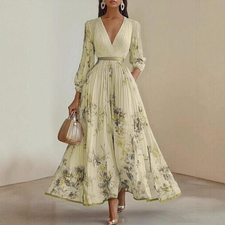 Sleeveless midi dress for women, featuring a beautiful pleated wrap. Perfect elegant party attire.
