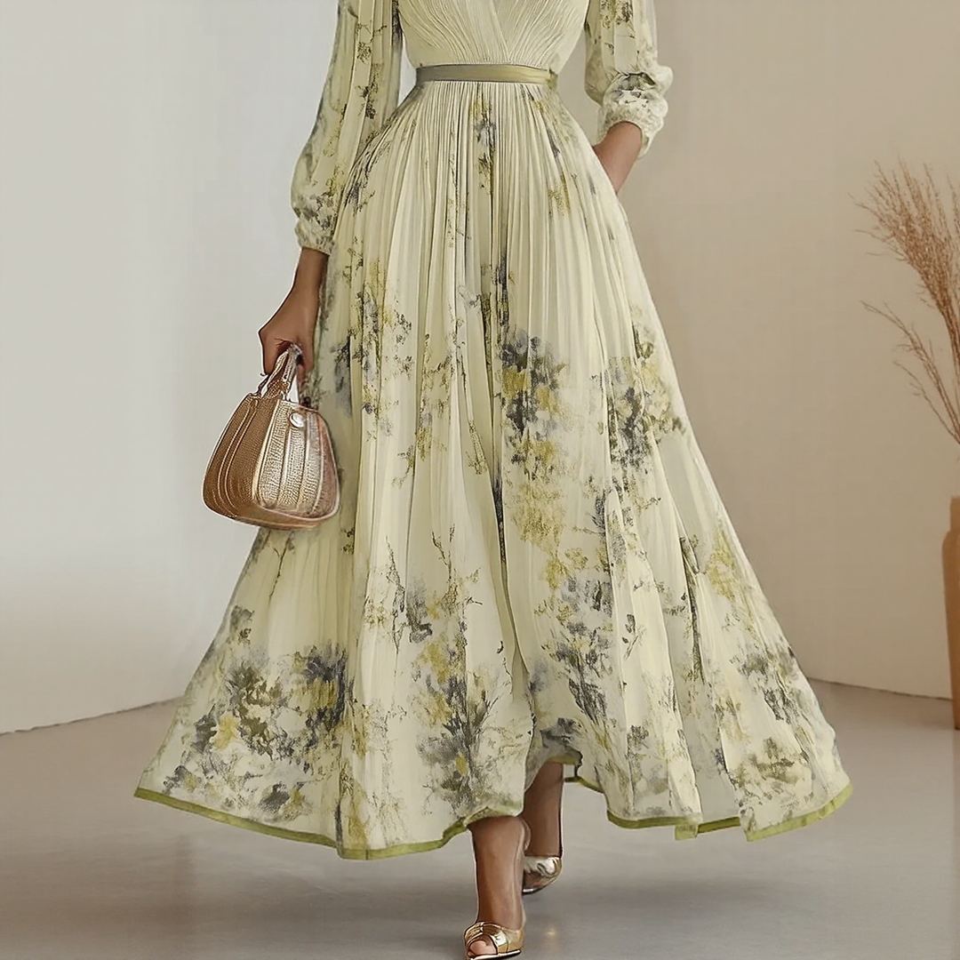 Flowy women's pleated wrap midi dress, an elegant sleeveless design for special occasion wear.