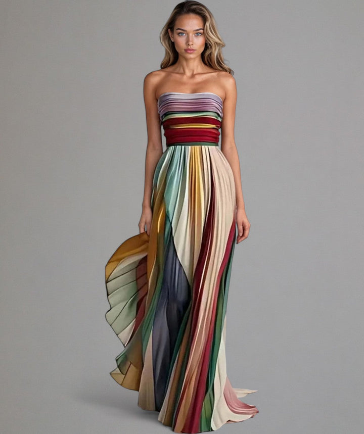 Flowing strapless pleated maxi dress for women. Perfect evening gown or party dress for elegant special occasions.