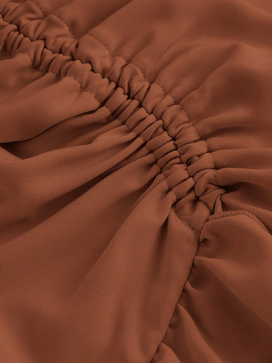 Elegant women's tiered midi skirt with flowing ruffle hem, ideal for a chic and feminine look.