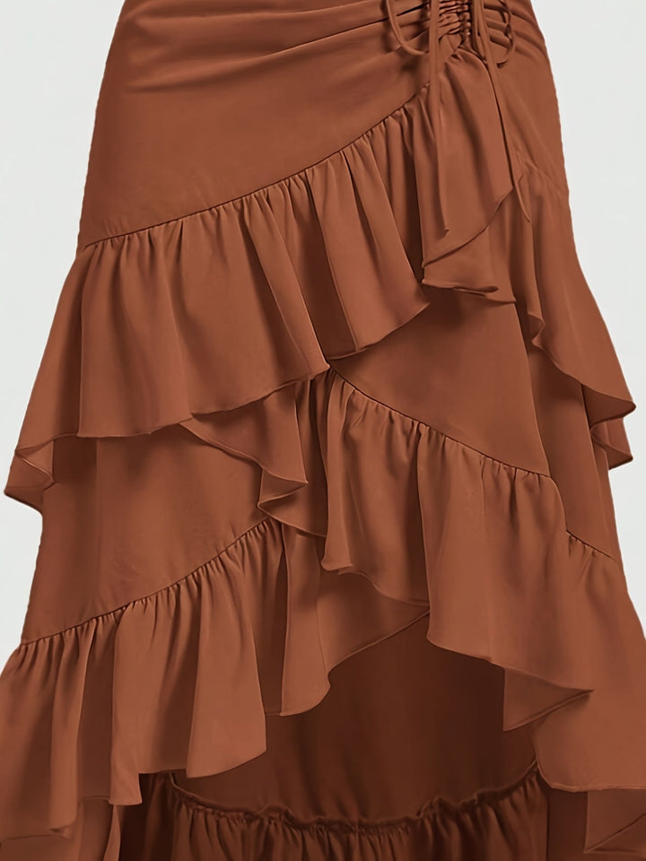 Close-up of the delicate tiered ruffles on a comfortable, flowy midi skirt for women.
