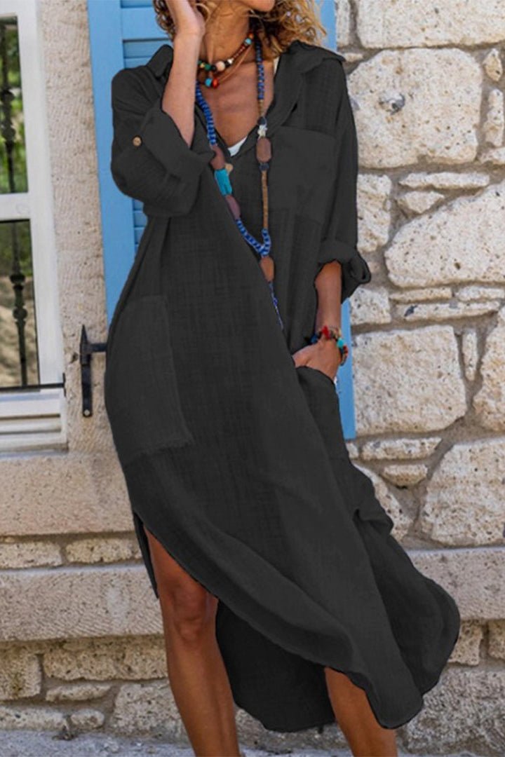 Women's polished V-neck relaxed midi dress. Elegant flowy summer day dress with a comfortable fit.