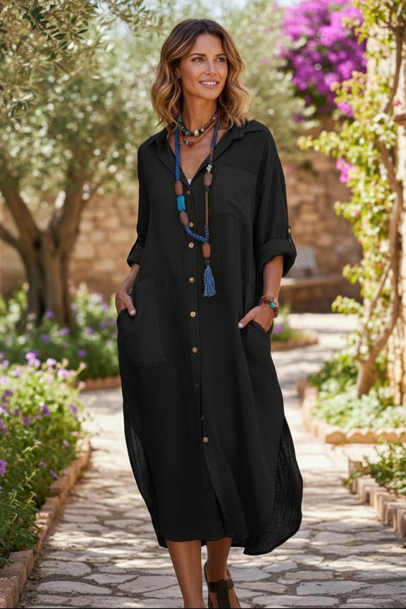 Casual women's relaxed fit V-neck midi dress. Comfortable oversized summer dress with practical pockets.