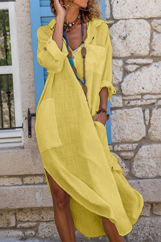 Women's summer V-neck midi dress with a relaxed, oversized fit. Perfect comfortable day dress for vacation.