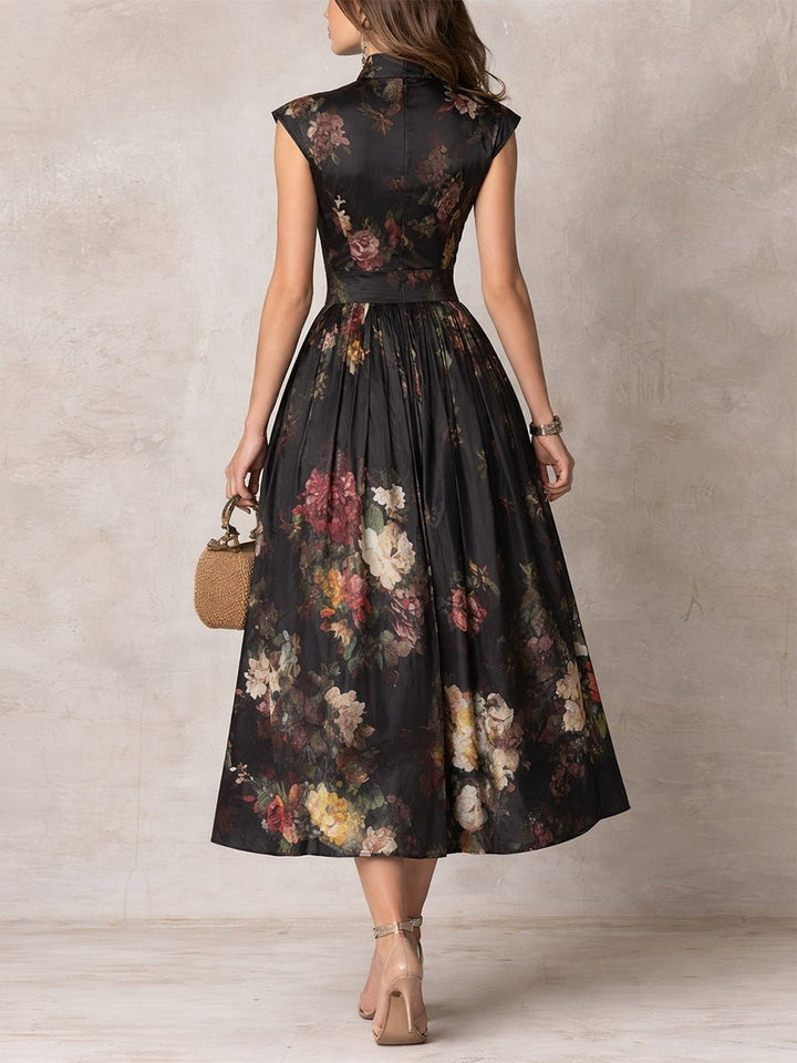 Vibrant floral print on an elegant flowy midi dress for women, featuring a stylish keyhole neckline.