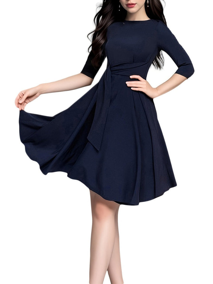 Elegant women's fit & flare midi party dress with a chic bow waist. Perfect for versatile occasions.
