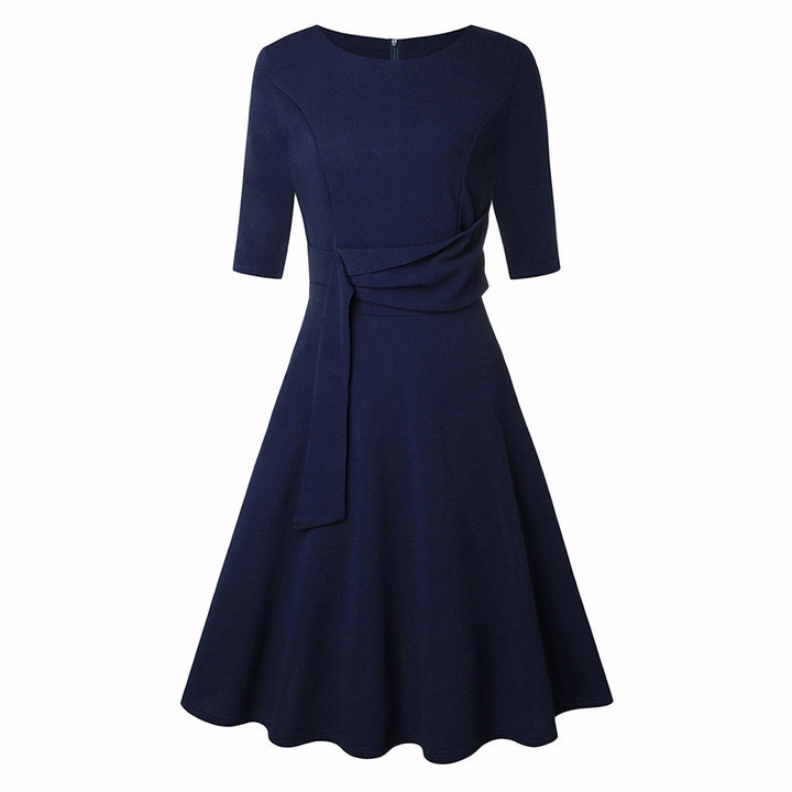 Women's versatile green fit & flare midi dress with an elegant bow waist. Perfect for formal or evening wear.