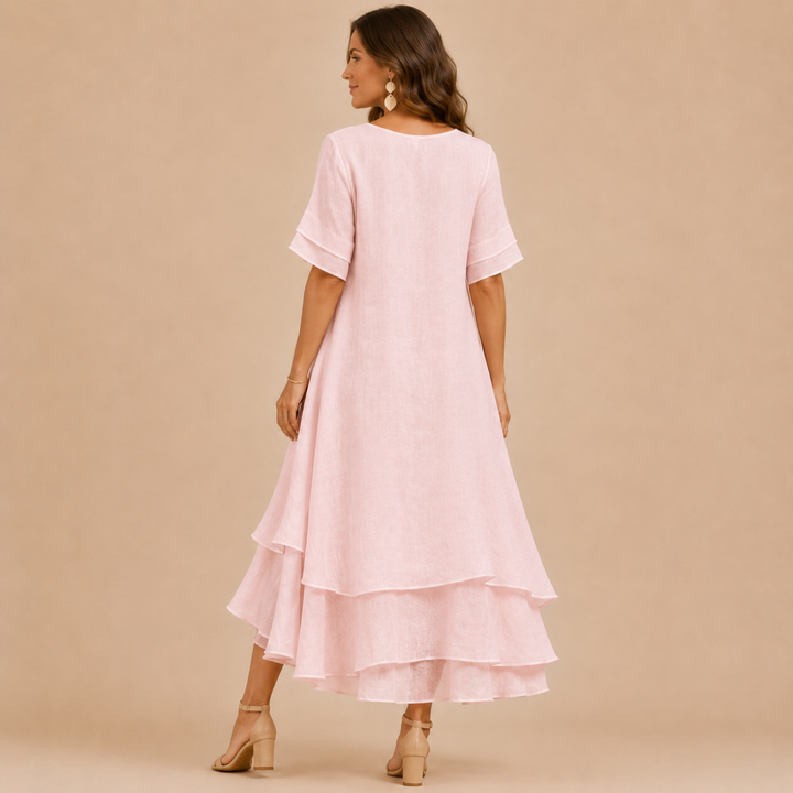 White casual tiered ruffle maxi dress for women, elegant and flowy, ideal for summer fashion.