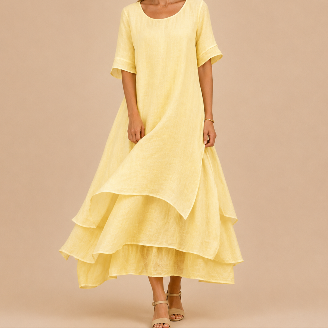 Yellow women's tiered ruffle maxi dress, offering effortless style for summer days and travel.