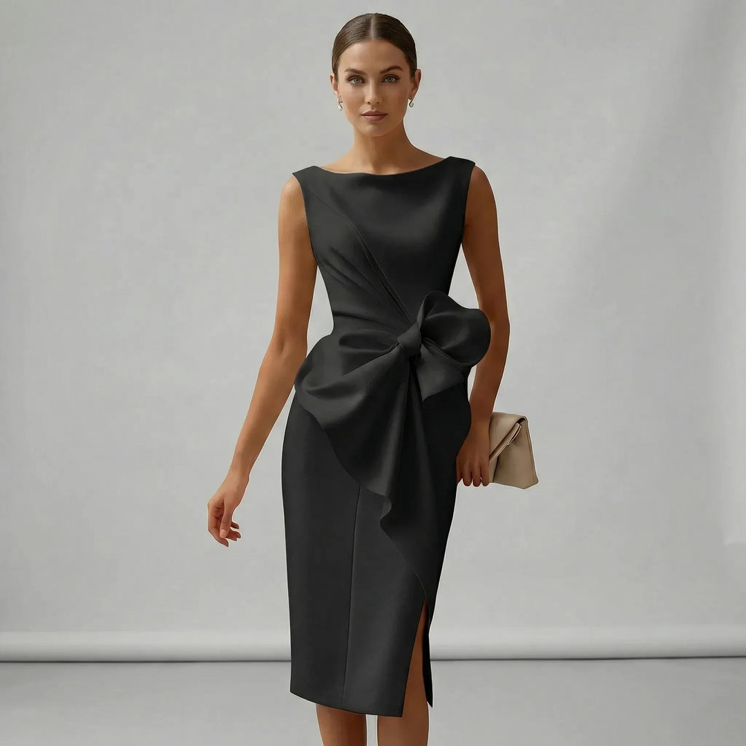 Feminine women's midi dress featuring a delicate bow detail, perfect elegant style for any special event.