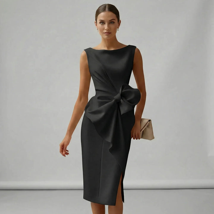 Feminine women's midi dress featuring a delicate bow detail, perfect elegant style for any special event.