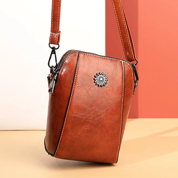 Green leather women's versatile shoulder bag, a chic everyday fashion accessory.