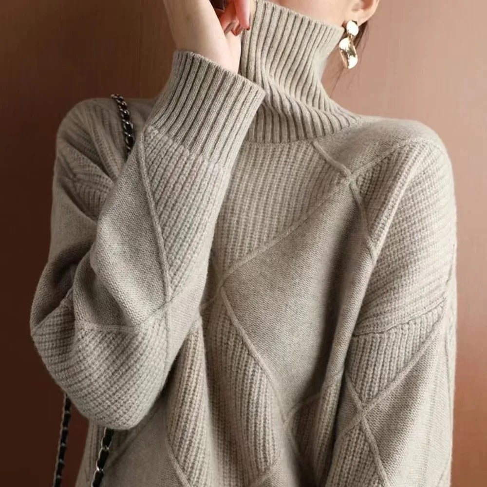 Classic women's elegant turtleneck sweater. A warm, long-sleeve pullover perfect for fall & winter fashion.