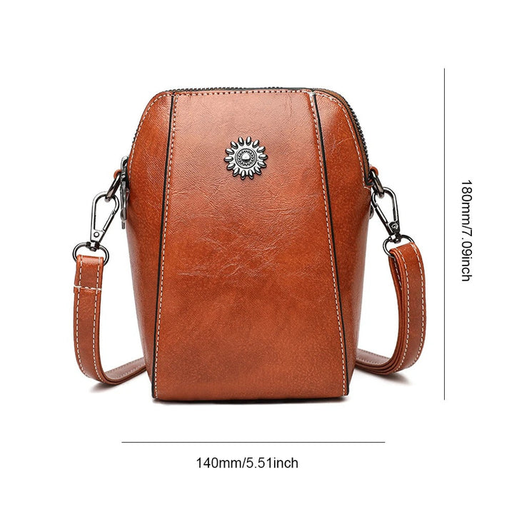 Stylish women's leather shoulder bag, versatile handbag with adjustable strap, available in multiple colors.
