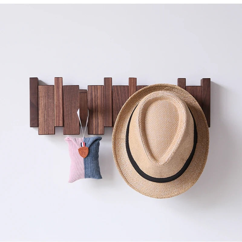 Wood piano-style coat rack, wall-mounted hanger. Modern decorative storage for coats in your entryway or hall.