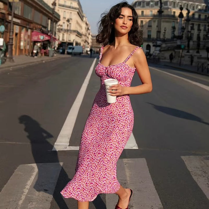 Elegant women's floral midi dress with graceful ruffle straps. A perfect summer day dress for any occasion.