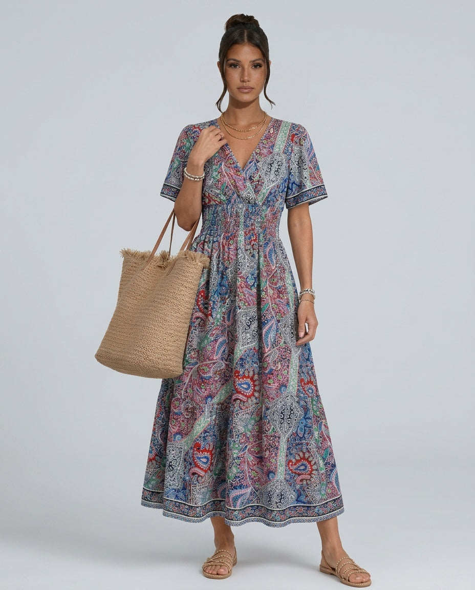 Flowy tiered maxi dress for women, boho paisley print, smocked waist, V-neck.