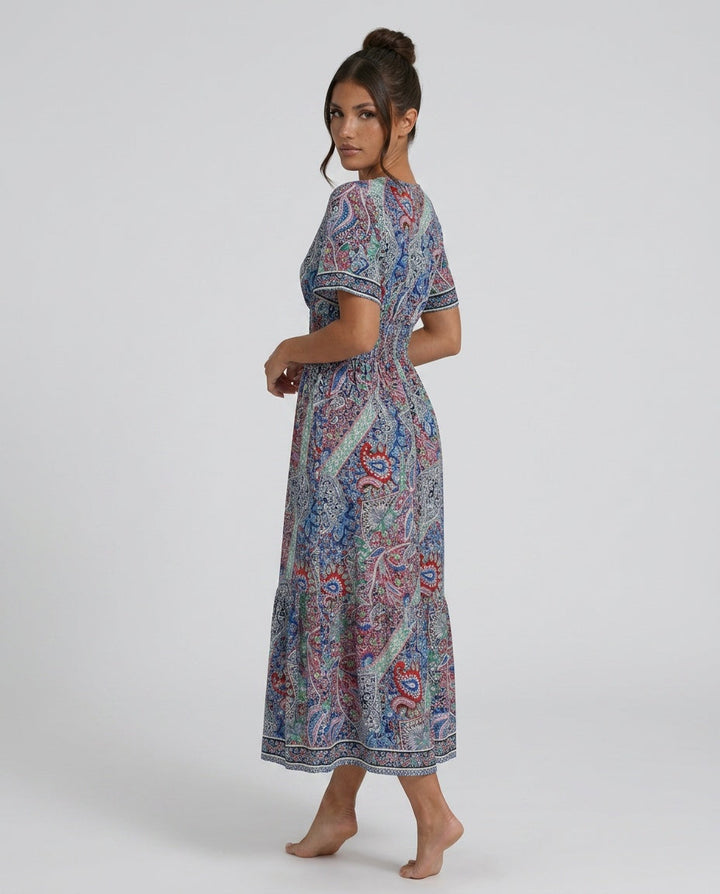 Beautiful women's paisley print boho maxi dress, smocked for comfort, perfect for beach.