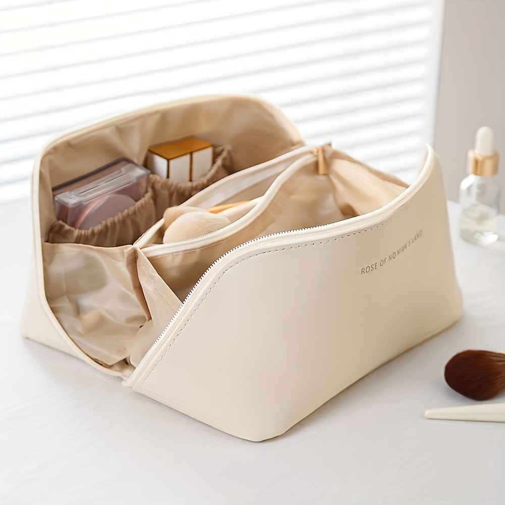 Elegant women's makeup organizer, a water-resistant PU leather cosmetic case ideal for travel.