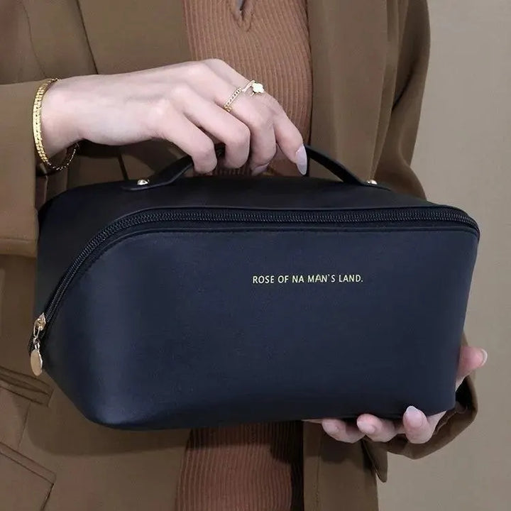 Spacious women's travel makeup organizer. Luxury zippered toiletry bag for cosmetics.