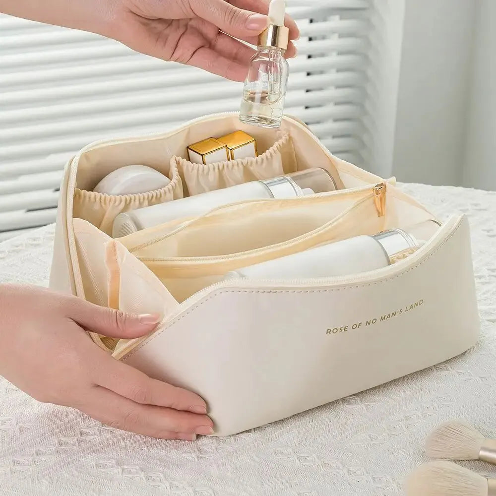 Durable women's luxury travel makeup organizer. Secure zippered toiletry pouch.