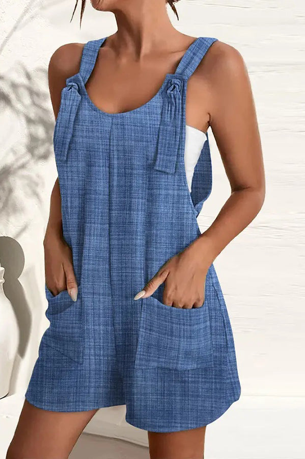 Comfortable women's summer jumpsuit in a vibrant print, with stylish wide legs and essential pockets.