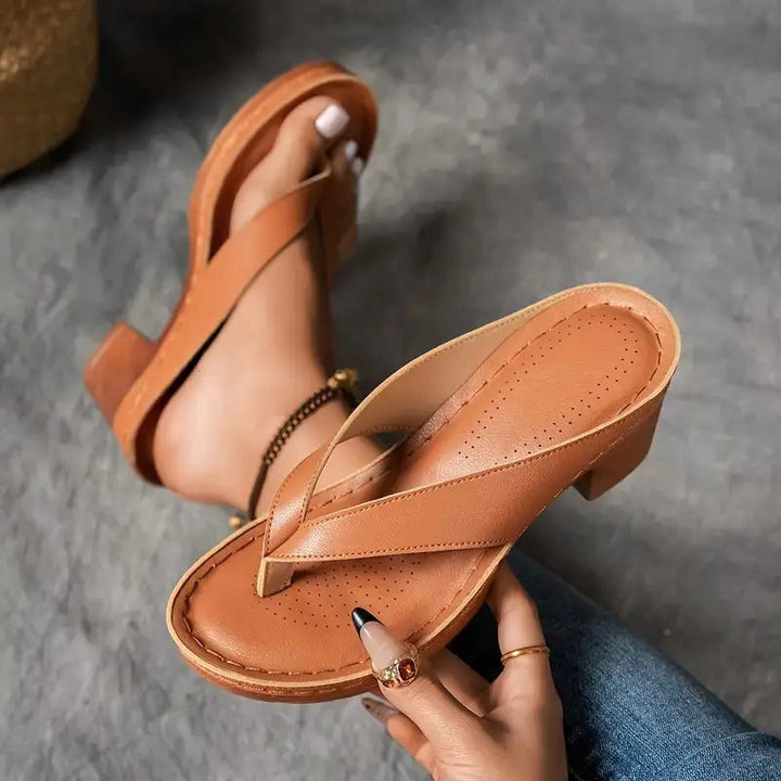 Cushioned women's summer slides, orthopedic design with arch support for breathable comfort.