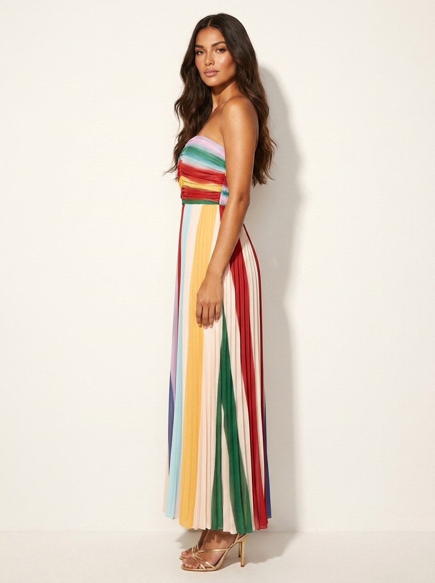Vibrant women's flowing pleated maxi dress, ideal for elegant party wear or chic casual summer occasions.