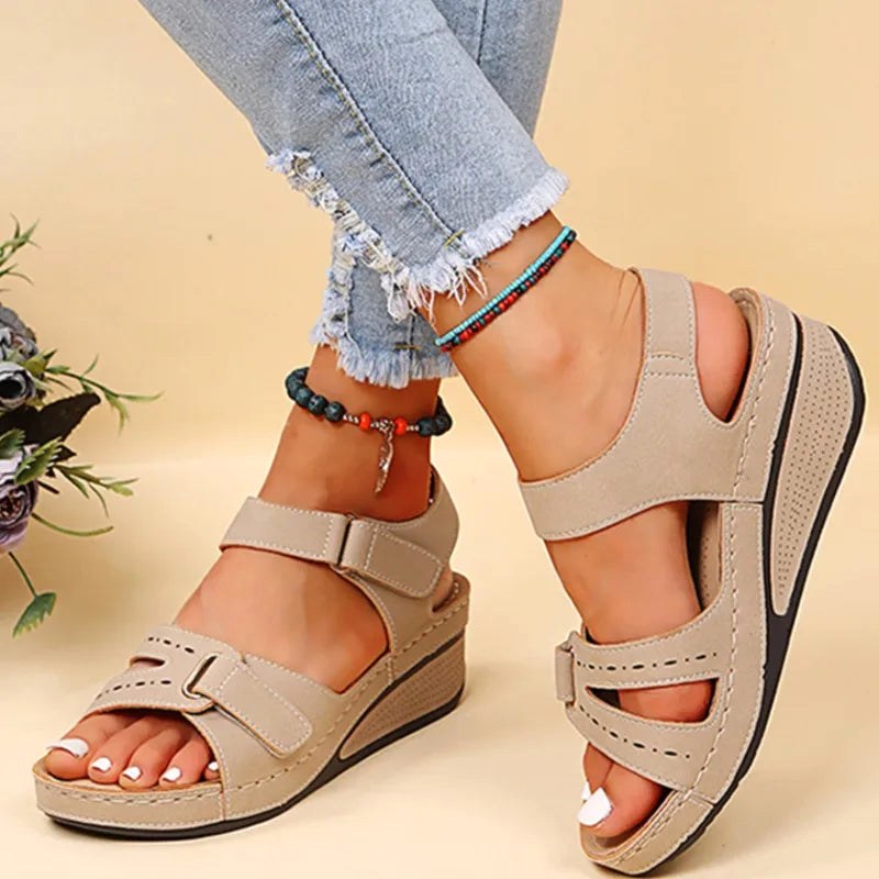 Comfortable women's orthopedic sandals with arch support, open toe design for walking.