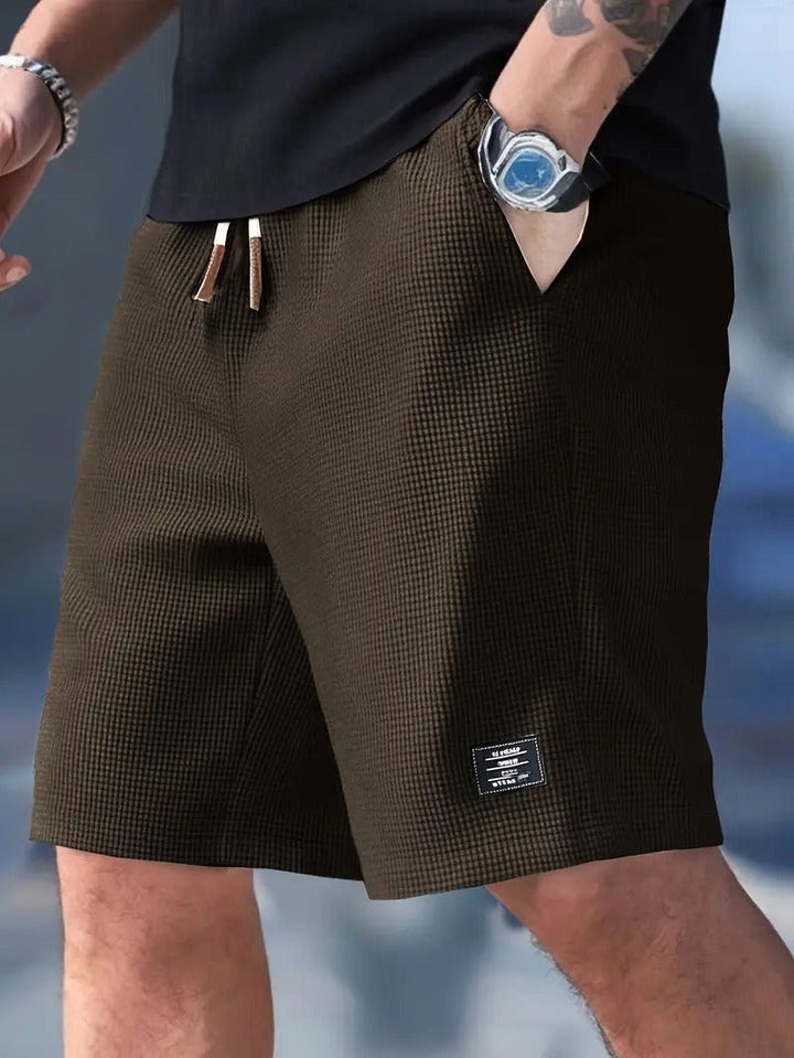 Go-anywhere men's relaxed-fit shorts, offering comfort and style for summer, travel, and daily wear.