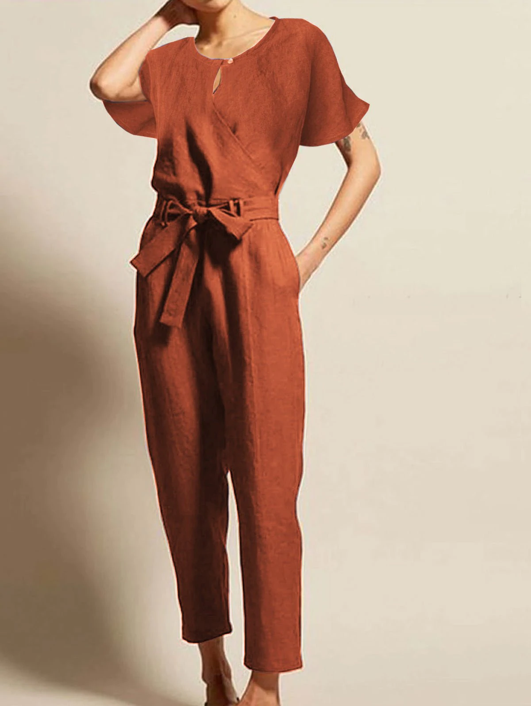 Radiant women's summer jumpsuit with short sleeves and a chic belt. Perfect elegant one-piece for day or night.