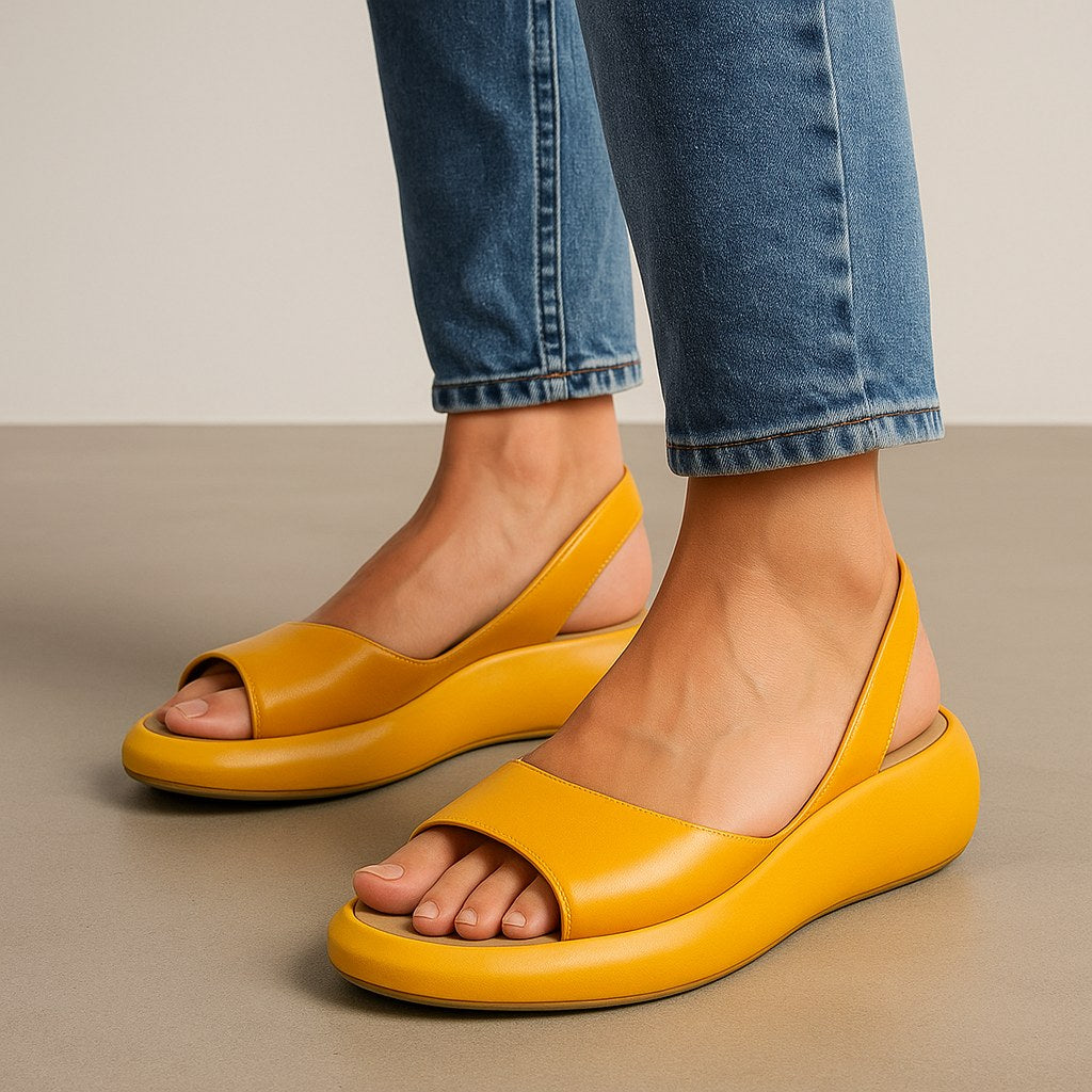 Women's open toe flat slip-on sandals, featuring a minimalist design for ultimate everyday comfort.