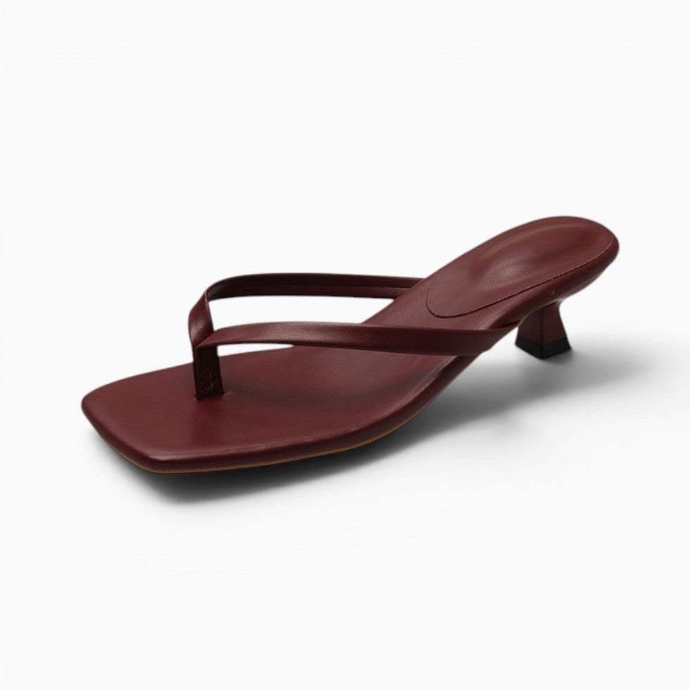 Chic women's minimalist thong block heel sandals. Great summer shoes for parties, casual outings, or evening events.