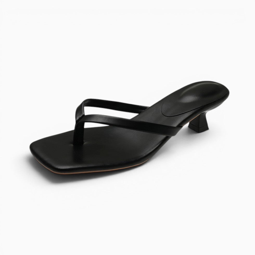 Women's slip-on minimalist thong block heel sandals. Comfortable, stylish summer shoes for everyday and vacation.
