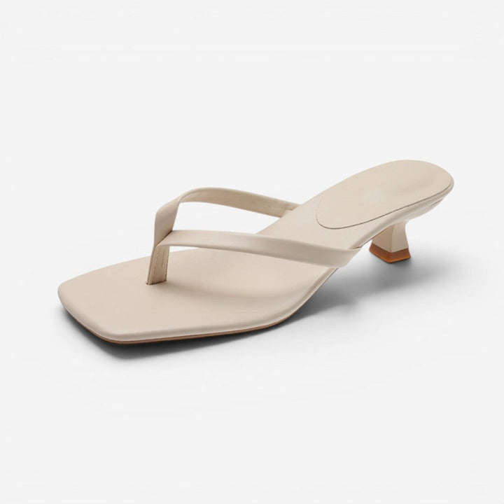 Versatile women's thong block heel sandals, minimalist style. Perfect for comfortable casual summer days or evening.
