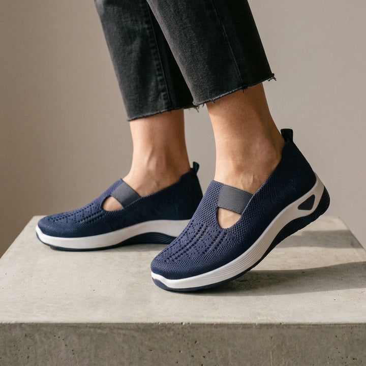 Grey orthopedic walking shoes for women, slip-on style, providing excellent arch & cushioned support.