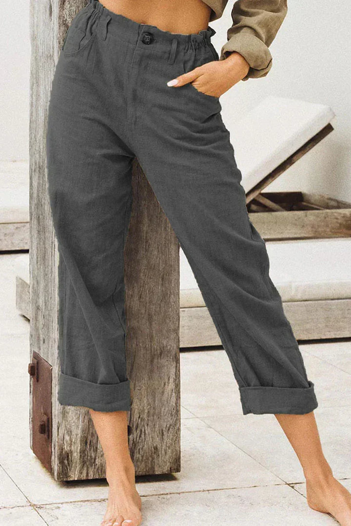Comfortable women's high waist linen wide leg pants with cuffed hem, perfect for casual summer travel.