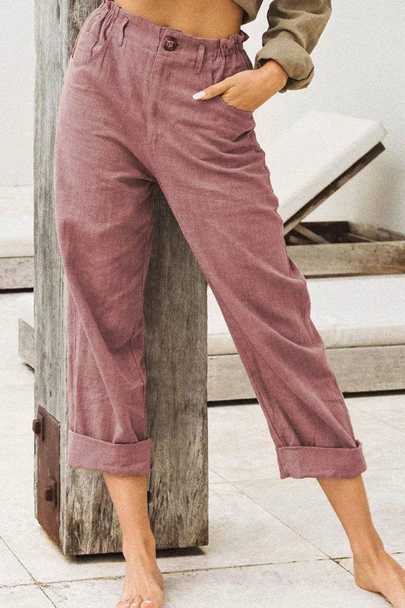 Relaxed fit women's elegant linen wide leg pants with a stylish cuffed hem, perfect for summer comfort.