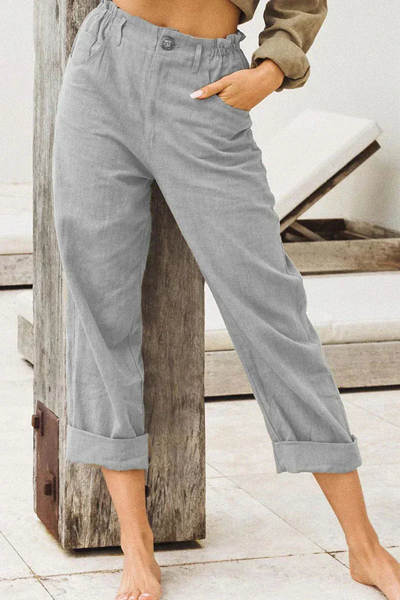 Women's versatile classic wide leg linen pants featuring a chic cuffed hem, great for casual summer wear.
