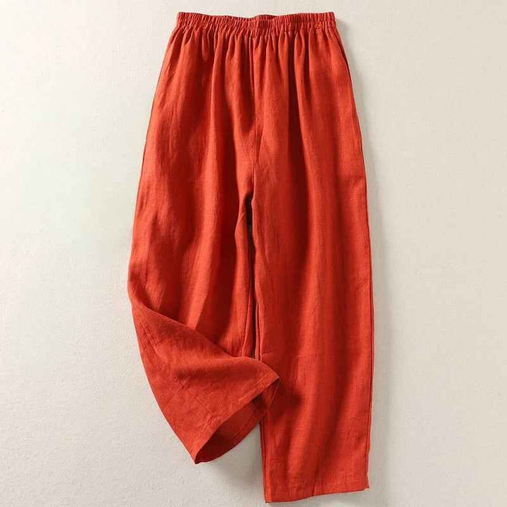 Women's refined relaxed wide leg linen pants with elastic waist. Comfortable & flowy for versatile summer casual style.