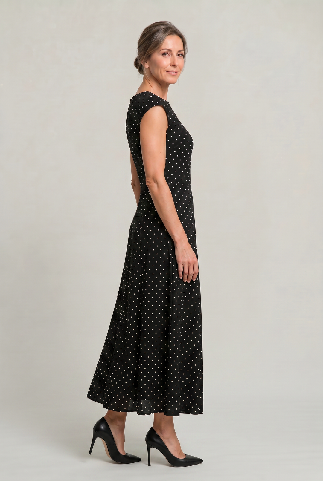 Timeless women's elegant polka dot maxi dress with cap sleeves, great for any special occasion or formal event.