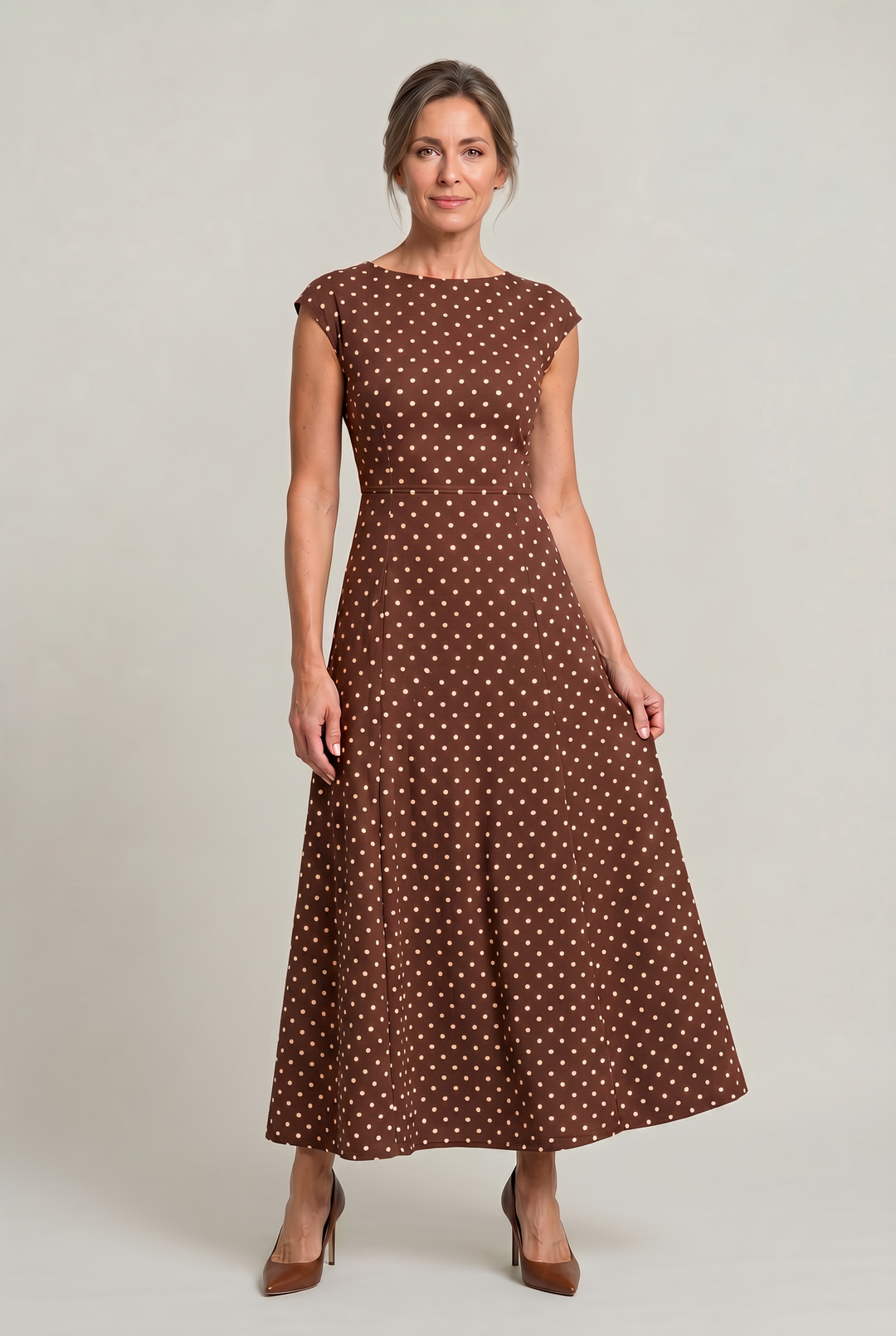 Versatile women's polka dot maxi dress with cap sleeves, perfect as a party dress or elegant evening gown.