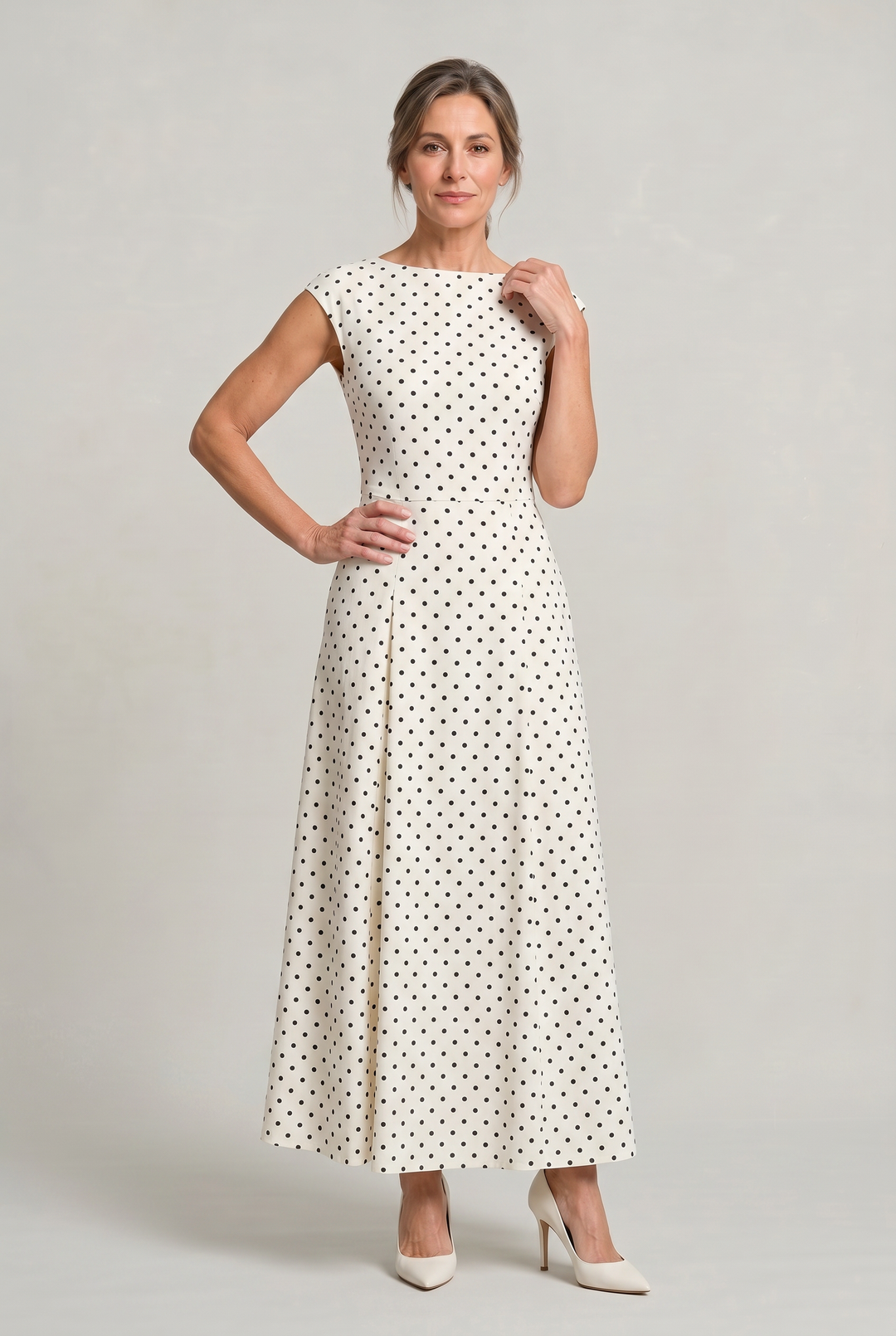 Chic women's polka dot cocktail maxi dress with elegant cap sleeves, suitable for special occasion formal wear.