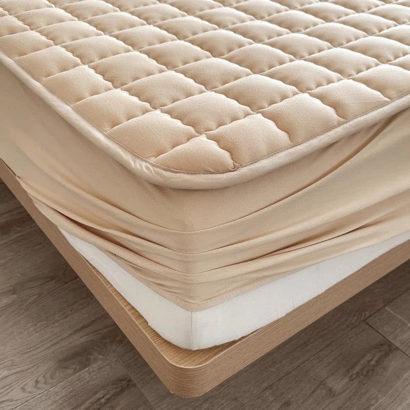 Washable DreamHaven mattress cover, protecting against allergens for better sleep & bedroom hygiene.