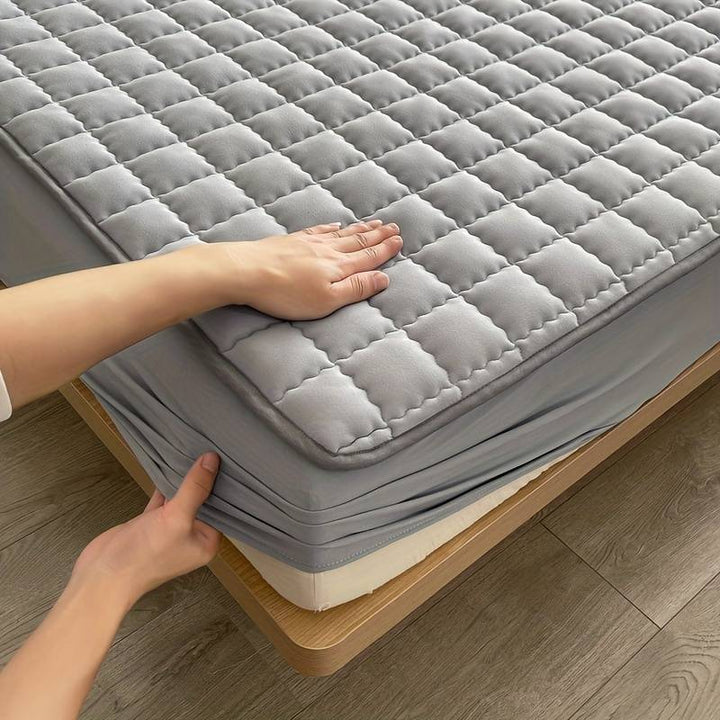 Durable DreamHaven mattress protector ensures deep, hygienic sleep; an essential bedroom bedding item.