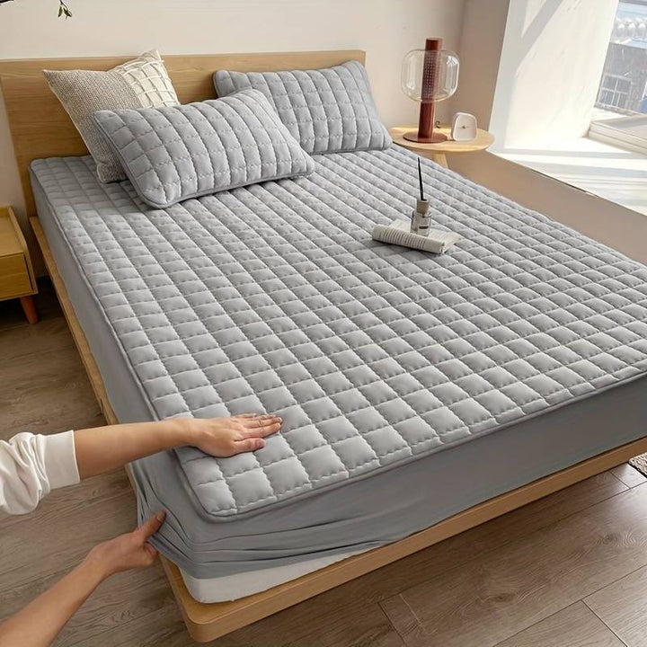 DreamHaven Mattress Protector for enhanced sleep & hygiene, a durable bed cover.