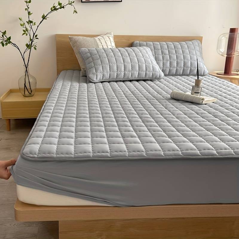 Hypoallergenic DreamHaven mattress cover, washable & durable for ultimate sleep comfort & hygiene.