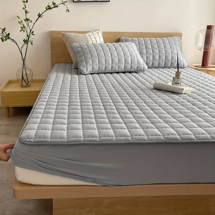 Hypoallergenic DreamHaven mattress cover, washable & durable for ultimate sleep comfort & hygiene.