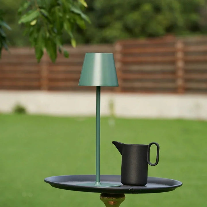 Dimmable LED table lamp, sleek design for contemporary indoor & outdoor decor.